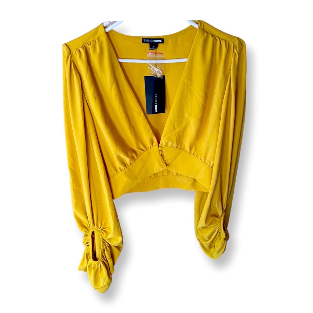 Yellow crop top Flowey  sleeves. Never worn. Tags still attached.